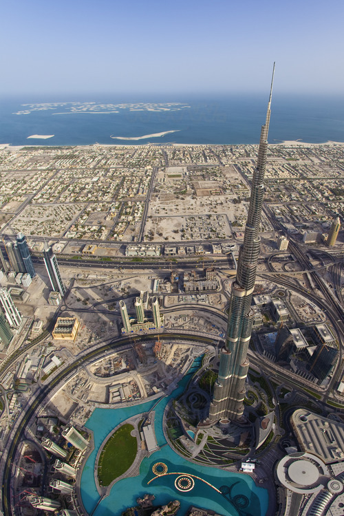 Aerial view over Burj Khalifa, tallest tower in the world with 828 meters, and the new district 