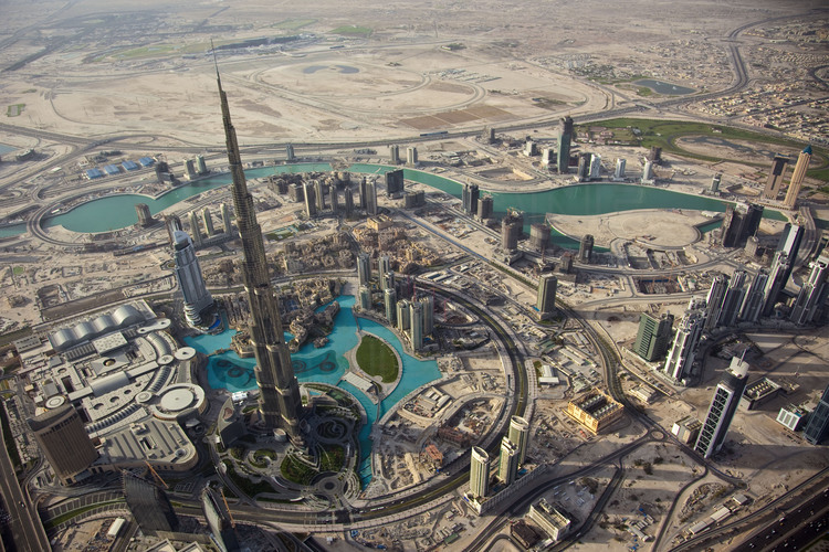 Aerial view over Burj Khalifa, tallest tower in the world with 828 meters, and the new district 