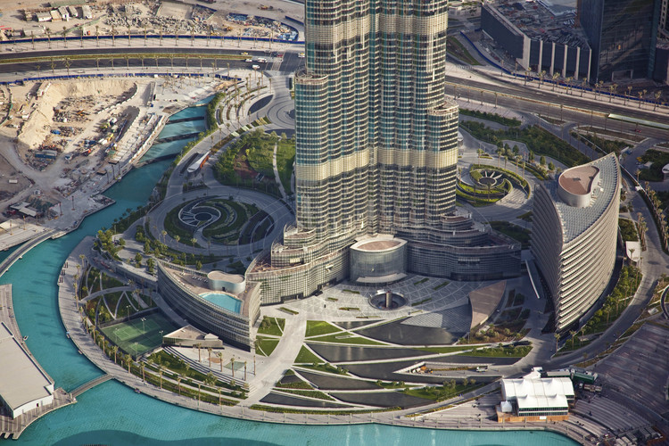Aerial view of the bottom of Burj Khalifa, tallest tower in the world with 828 meters, and the new district 