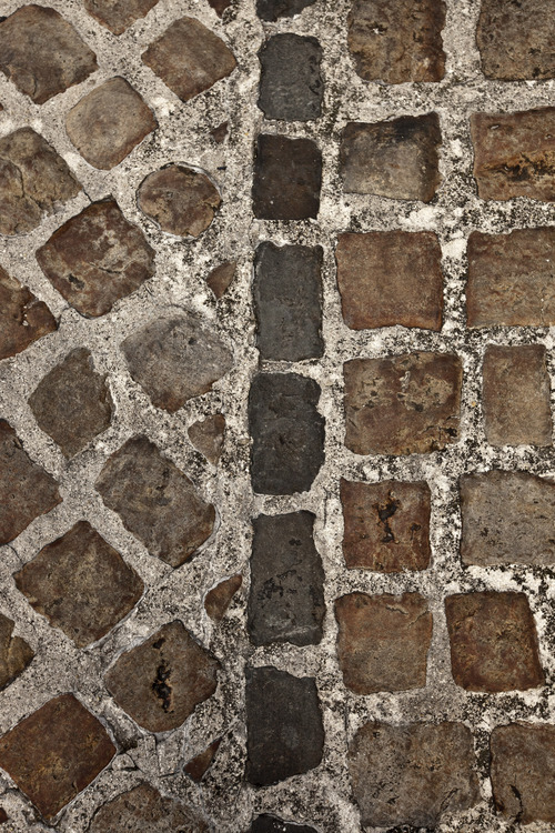 In the historical center, details of medieval paved streets.