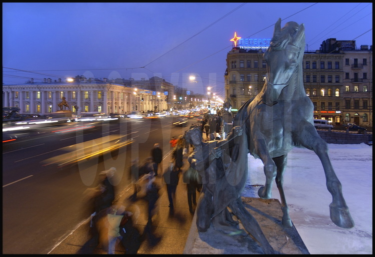 Four horses and their trainers, designed by Peter Klodt in 1840 frame the 
Fontanka Canal and cross the Nevsky Prospect.  Everyday, five million St 
Petersburg inhabitants cover the central artery of Vladimir Putin's native 
city.  Many churches of different persuasions built in the 18th and 19th 
centuries have baptized the avenue with the name of 