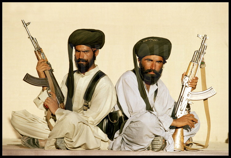 Kawan Buchq (left) and Nazer Mohammad (right), armed with their Kalashnikov assault rifles. Members of the elite group of warriors of Nawab (the Bugti King), these men were relieved of their usual duties to guard the expedition for 5 weeks.