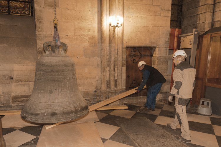 Notre Dame de Paris, 17 February 2012. The four ancient bells, hung 45 meters high in the north tower, are filed one after the other. Once unhooked, they are descended to the ground carefully, through a succession of loculis, built for this purpose at the time of the Middle Ages. Started at 4pm, the operation ends at 9pm.