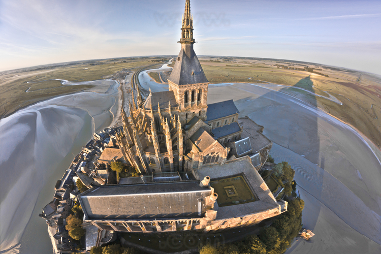 Mont Saint Michel as seen from the north. In the foreground, the refectory of Wonder (left) and the cloister (right).