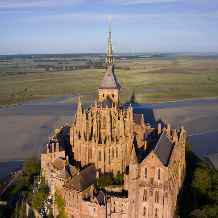 Overview of the Mont Saint Michel from the east. In the foreground, the chevet of the church. On the right, the Wonder.