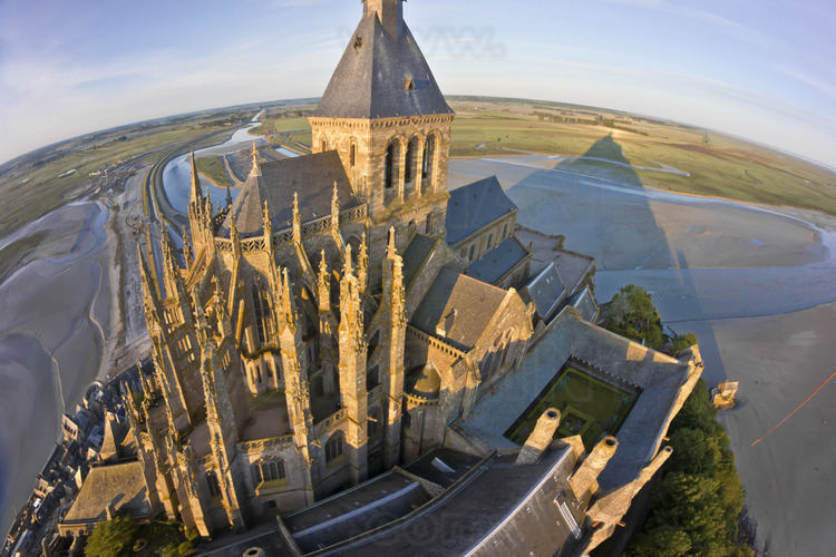Mont Saint Michel as seen from the northeast. In the foreground, the chevet of the church.