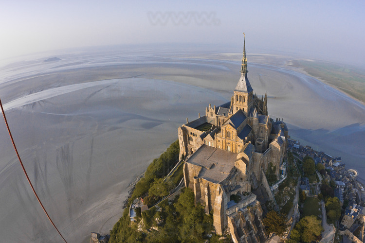 Overview of the Mont Saint Michel from the southwest. In the background on the left, the island of Tombelaine.