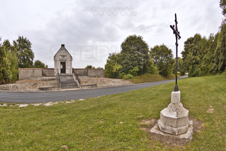 Battles of Champagne: the remains of the destroyed village of Nauroy, which was not rebuilt after the war. It is now converted into a very large roundabout road, and trees. In the background, a memorial chapel, built in the mid-1920s.