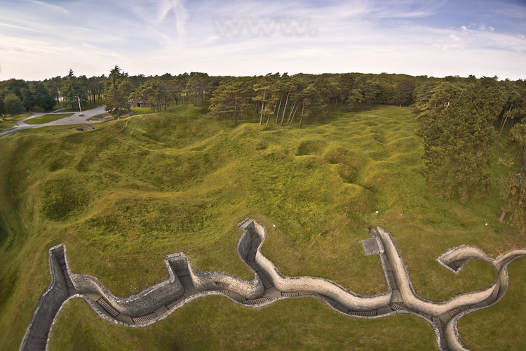 Battle of Artois: Vimy Ridge, Canadian National Historic Site. The no man's land of the front line (center), is still riddled with craters due to mine warfare and shrapnel. Background, the trenches of the first Allied lines. Foreground, the first German trench lines. Between the two, about 25 meters. After an assault launched on 9 April 1917, the troops with the maple leaf, met for the first time in a non British single corps, wins Vimy Ridge, marking a major chapter in the history of the Canadian nation. The Vimy ridge is forested today (background): Each tree was planted by a Canadian and symbolizes the sacrifice of a soldier.