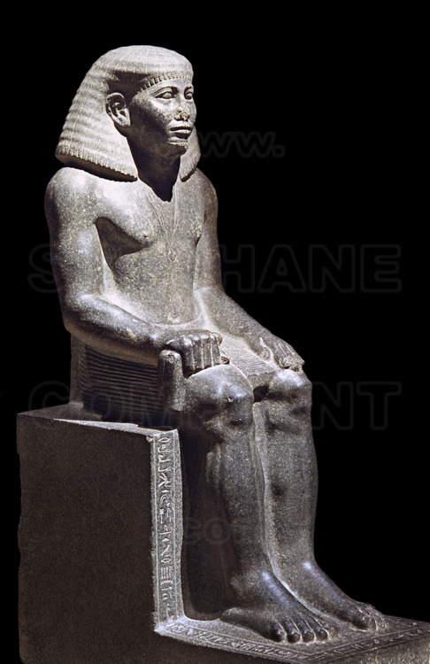 Statue en granite de Sarenpout II, aimé de Heqaib, gouverneur d’Éléphantine (Assouan). Règne de Sésostris II et III. Moyen Empire.