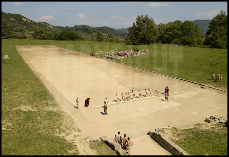 Start of the diaulos (2x192m) competition.  In the event of a tie, the hellanodices choose the winner based on aesthetic criteria.