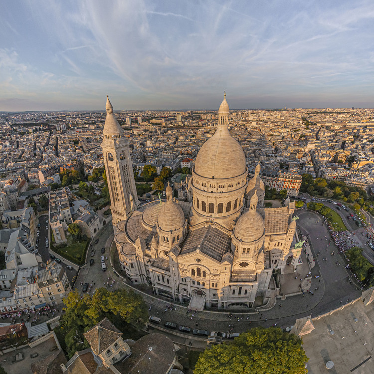 Paris (75) - La butte Montmartre et la basilique du Sacré Coeur vus depuis le Sud. Située au sommet de la butte Montmartre, la basilique du Sacré-Cœur, est l'un des édifices religieux majeurs de Paris. Sa construction est décidée en 1870 (juste après la guerre franco-allemande) lors du vœu national d'Alexandre Legentil et Hubert Rohault de Fleury, et sera achevée en 1914. Sa situation à 130 m d'altitude près de l'un des points culminants de Paris, et son dôme qui s'élève à 83 mètres, la rendent visible de très loin. Avec près de onze millions de pèlerins et visiteurs par an, c'est le deuxième monument religieux parisien le plus visité après la cathédrale Notre-Dame de Paris. // Paris (75) - The Montmartre hill and the Sacré Coeur basilica seen from the South. Located at the top of the Montmartre hill, the Sacré-Coeur basilica is one of the major religious buildings in Paris. Its construction was decided in 1870 (just after the Franco-German war) during the national wish of Alexandre Legentil and Hubert Rohault de Fleury, and will be completed in 1914. Its location at 130 m above sea level near one of the points highlights of Paris, and its dome which rises to 83 meters, make it visible from far away. With nearly eleven million pilgrims and visitors a year, it is the second most visited Parisian religious monument after Notre-Dame de Paris cathedral.