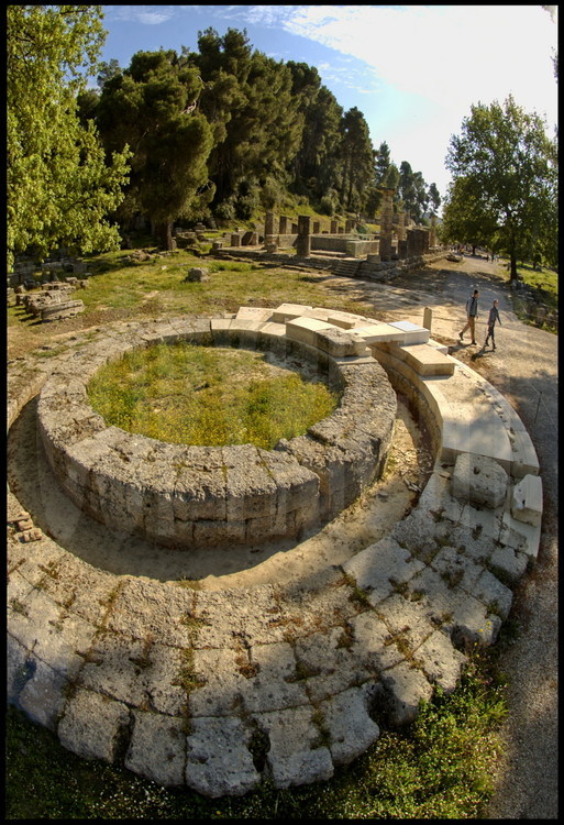 The winning cities and sovereigns of the Games erected trophies in the heart of the sanctuaries.  Here, in the center of the Altis, a small temple dedicated to Philip II of Macedonia, father of Alexander the Great and winner of the chariot competition in Olympia, as owner of the winning stable.