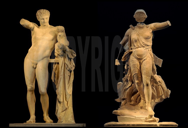 Without a doubt two of the most famous sculptures of Greek Classical art.  
-Artist Praxitel’s Paros marble Hermes, 2.13 meters tall, was made around 340 B.C and was found in the temple of Hera in Olympia.  Thanks to a stroke of luck, not only is the god’s slender body in excellent condition, but so are his dreaming face, opulent hair and the delicate contours of his forehead and cheeks (left).  
-The famous statue of victory by Paionios, 2.12 meters tall (424 B.C) by the artist of the same name, was raised on a rectangular pedestal of about 9 meters high in front of the eastern facade of Zeus’ temple.  The goddess, open-winged, is shown coming down from the sky to crown the winners of the Olympic Games.  This masterpiece of Classical Greek sculpture constitutes a technical prowess: this was the first time that wings had been rendered with such realism (right).  
Archeological Museum of Olympia.