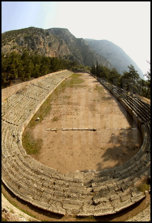 The ancient stadium, at the top of the majestic site of Apollo’s sanctuary in Delphi, was rebuilt during the Roman era.  This is why there are stone steps instead of slopes from the Greek Classical era.