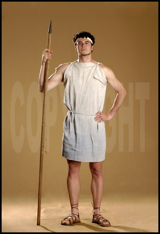 Young athletes dressed and equipped like their ancestors of the Olympic games.  The javelin.