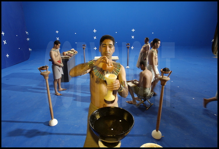 Filming  of scenes from the film in a studio located near Cairo. The blue key background is necessary to add in 3-D computer effects later on. This is a scene from the purification and adoration ceremony officiated by high priest Hau-Nefer.