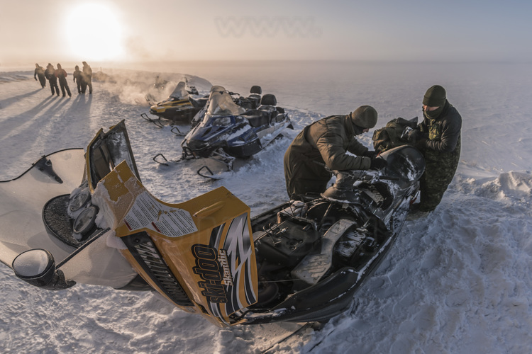 Canada - State of Nunavut - Operation NUNALIVUT 2018 - Surroundings of Cambridge Bay - Because of the polar temperature, snowmobiles are started each morning at least one hour before departure.