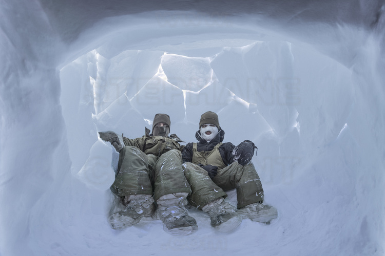 Canada - State of Nunavut - Operation NUNALIVUT 2018 - Surroundings of Cambridge Bay - Survival Camp 2, located on a bay in the Northwest Passage. Interior of the igloo made by Rangers Tommy Epakolak in less than two hours. Essential know-how in the polar environment, where this makeshift shelter can save lives in the event of a mechanical problem or weather that is suddenly degraded (blizzard).